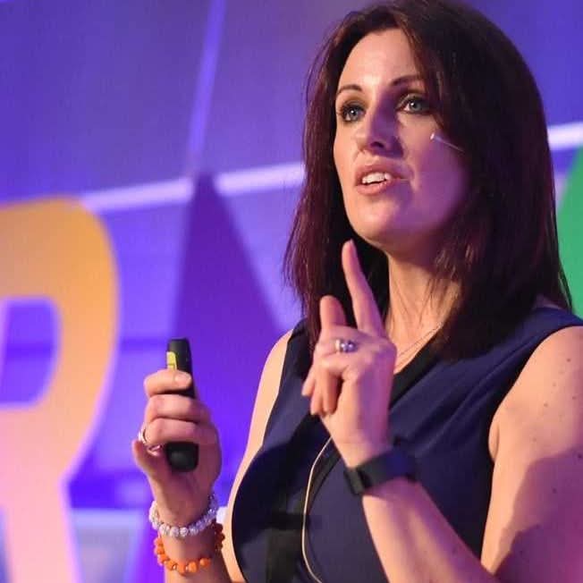 Louise McDonnell speaking at an event