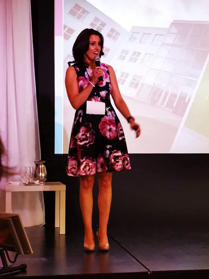 Louise McDonnell speaking at a summit