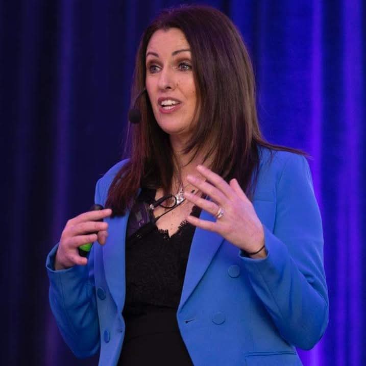Louise McDonnell speaking at a marketing event
